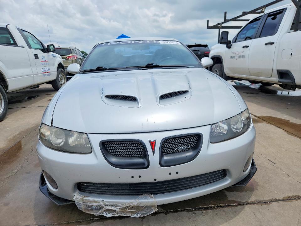 2005 Pontiac Gto VIN 6G2VX12U25L406771 COPART salvage auction — SIDE, TX - SALVAGE VEHICLE TITLE (P), sold $6,900 on 2026-07-16 (photo 5)