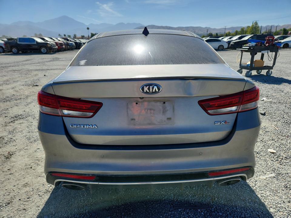 2018 Kia Optima VIN 5XXGV4L2XJG194878 COPART salvage auction — ENGINE BURN, Ca - Salvage Certificate, sold $500 on 2026-07-29 (photo 6)