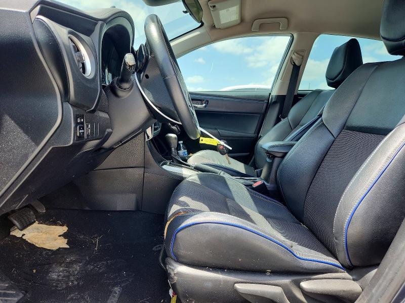 2018 Toyota Corolla VIN 5YFBURHE5JP816565 COPART salvage auction — WATER/FLOOD, TX - SALVAGE TITLE-FLOOD DAMAGE, sold $1,800 on 2026-07-24 (photo 7)