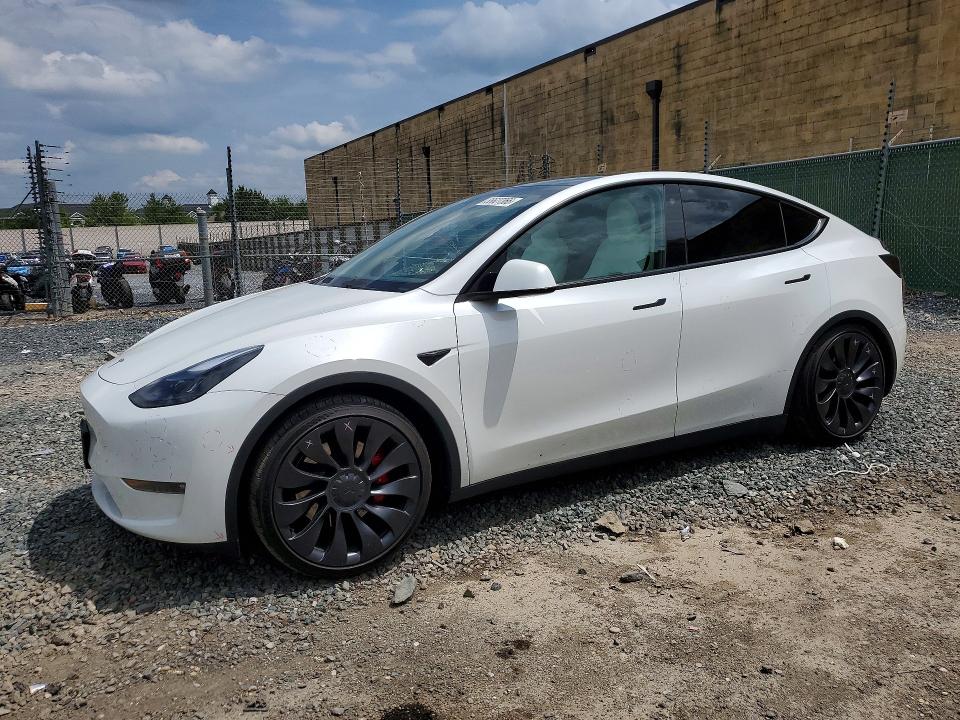 2023 Tesla Model y VIN 7SAYGDEF7PF788423 COPART salvage auction — REAR END, Salvage Title, sold $13,500 on 2026-07-23 (photo 1)
