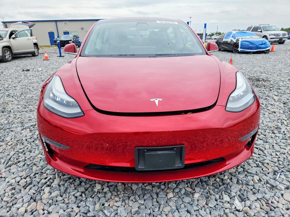 2019 Tesla Model 3 VIN 5YJ3E1EA9KF308357 COPART salvage auction — SIDE, Fl - Cert Of Title Slvg Rebuildable, sold $6,600 on 2026-07-07 (photo 5)