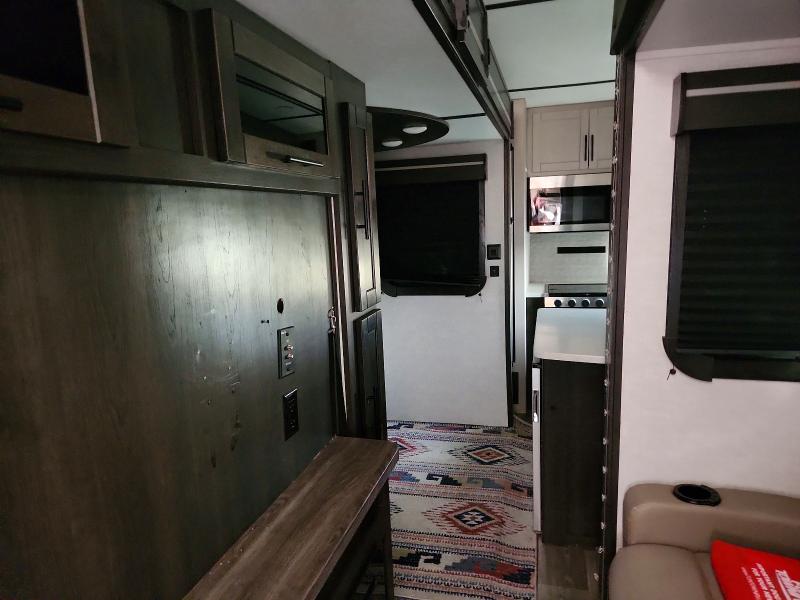 2021 Keystone Cruiser ai VIN 4YDF29R27M6320820 COPART salvage auction — ROOF, TX - SALVAGE VEHICLE TITLE, sold $9,400 on 2026-07-30 (photo 6)