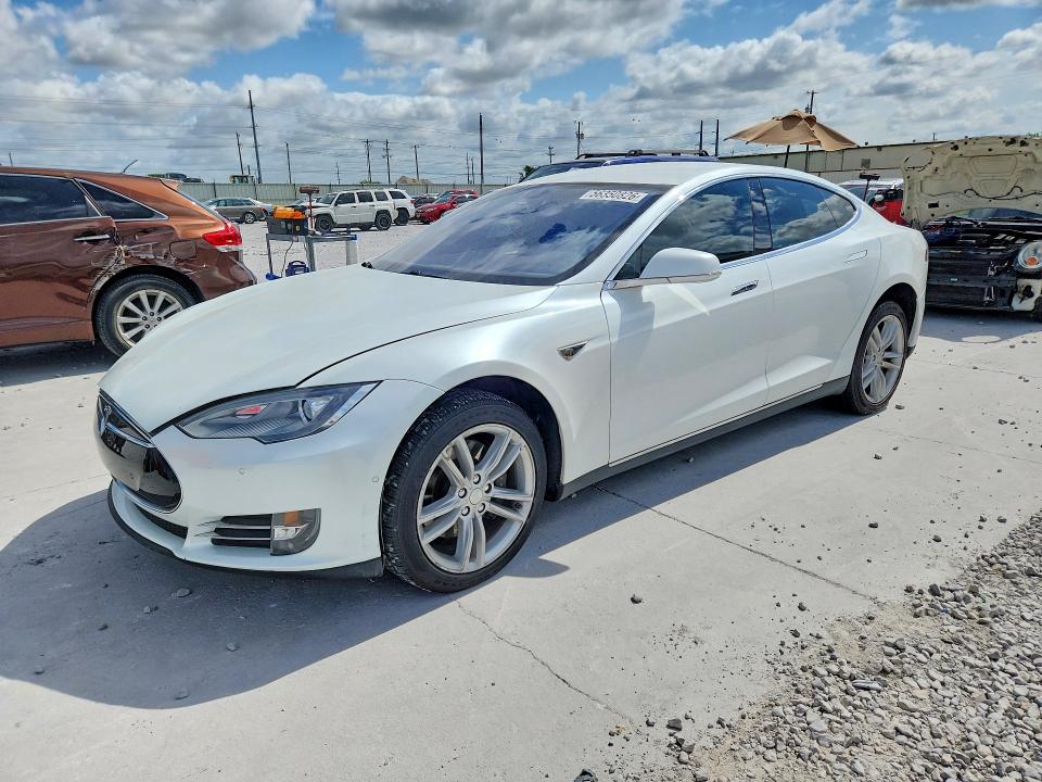 2014 Tesla Model s VIN 5YJSA1H20EFP67857 COPART salvage auction — WATER/FLOOD, TX - SALVAGE TITLE-FLOOD DAMAGE, sold $825 on 2026-07-24 (photo 1)
