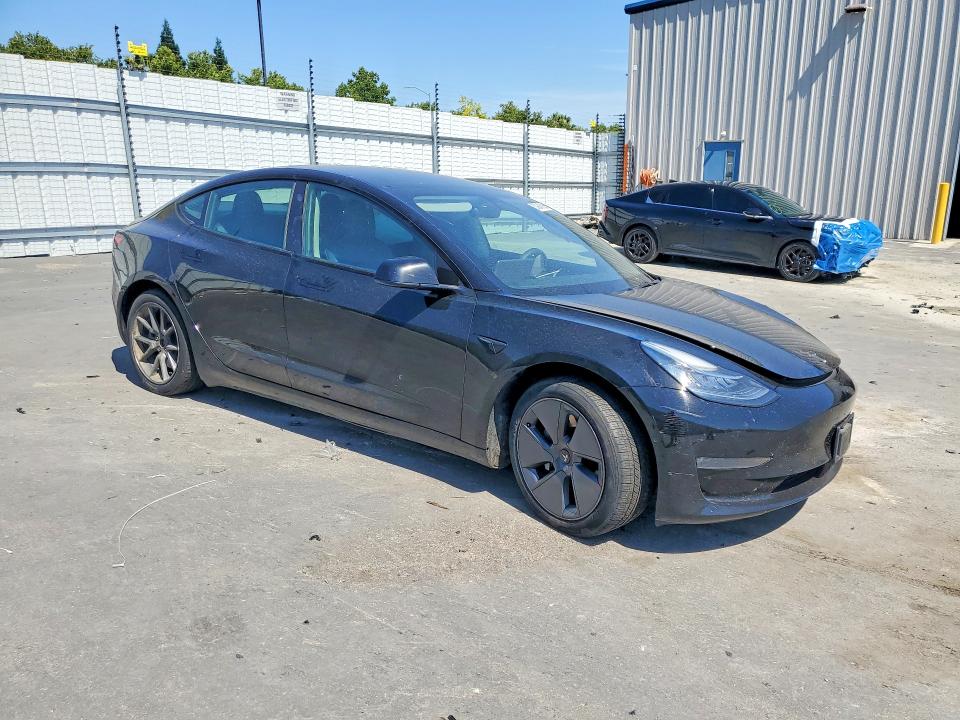 2022 Tesla Model 3 VIN 5YJ3E1EB7NF239679 COPART salvage auction — SIDE, Ca - Salvage Certificate, sold $6,400 on 2026-07-23 (photo 4)