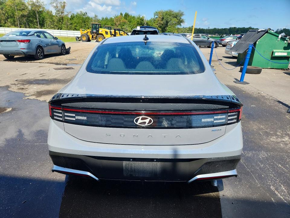 2026 Hyundai Sonata hybrid VIN KMHL24JJ9TA145926 COPART salvage auction — FRONT END, FL - CERTIFICATE OF DESTRUCTION, sold $5,700 on 2026-07-27 (photo 6)
