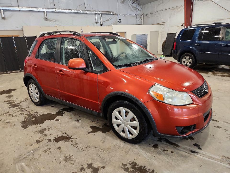 2010 Suzuki Sx4 VIN JS2YB5A33A6300218 COPART salvage auction — MINOR DENT/SCRATCHES, Nc - Parts Only-Record Of Sale, sold $250 on 2026-07-08 (photo 4)