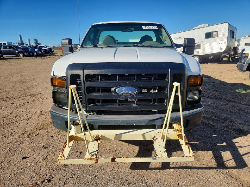 2009 Ford F-250 super duty VIN 1FDNF20579EB05898 COPART salvage auction — MINOR DENT/SCRATCHES, Nm - Certificate Of Title, sold $750 on 2026-07-09 (photo 5)