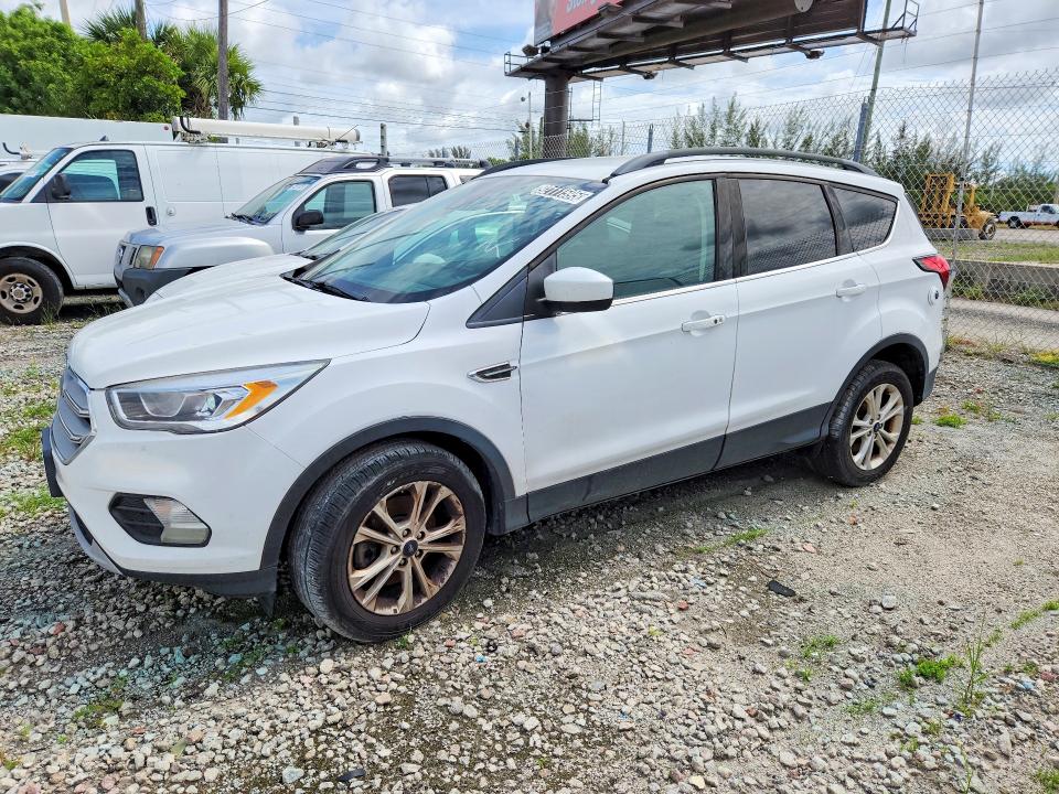 2019 Ford Escape VIN 1FMCU9HD0KUB14827 COPART salvage auction — MINOR DENT/SCRATCHES, Fl - Certificate Of Title, sold $2,050 on 2026-07-09 (photo 1)