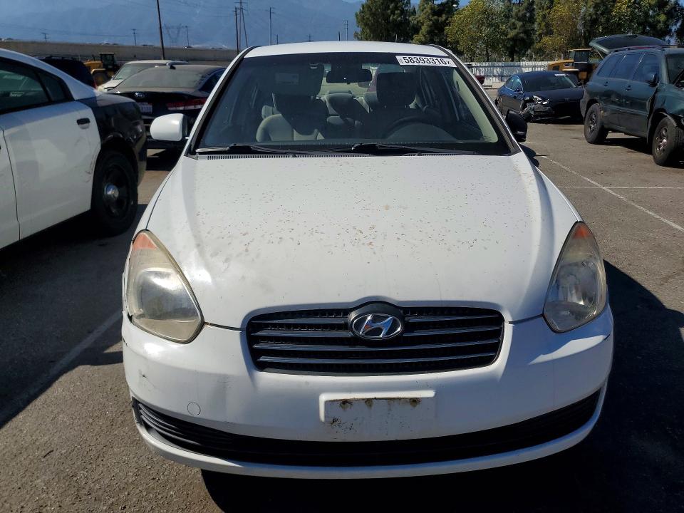 2011 Hyundai Accent VIN KMHCN4ACXBU606640 COPART salvage auction — MINOR DENT/SCRATCHES, Ca - Dis/Dlr/Exp Only Clean Title, sold $475 on 2026-07-28 (photo 5)