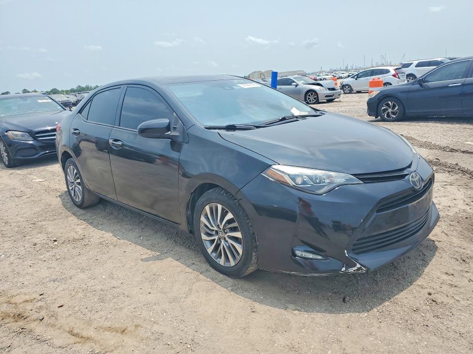 2018 Toyota Corolla VIN 5YFBURHE3JP840962 COPART salvage auction — SIDE, Tx - Salvage Vehicle Title, sold $2,450 on 2026-07-27 (photo 4)