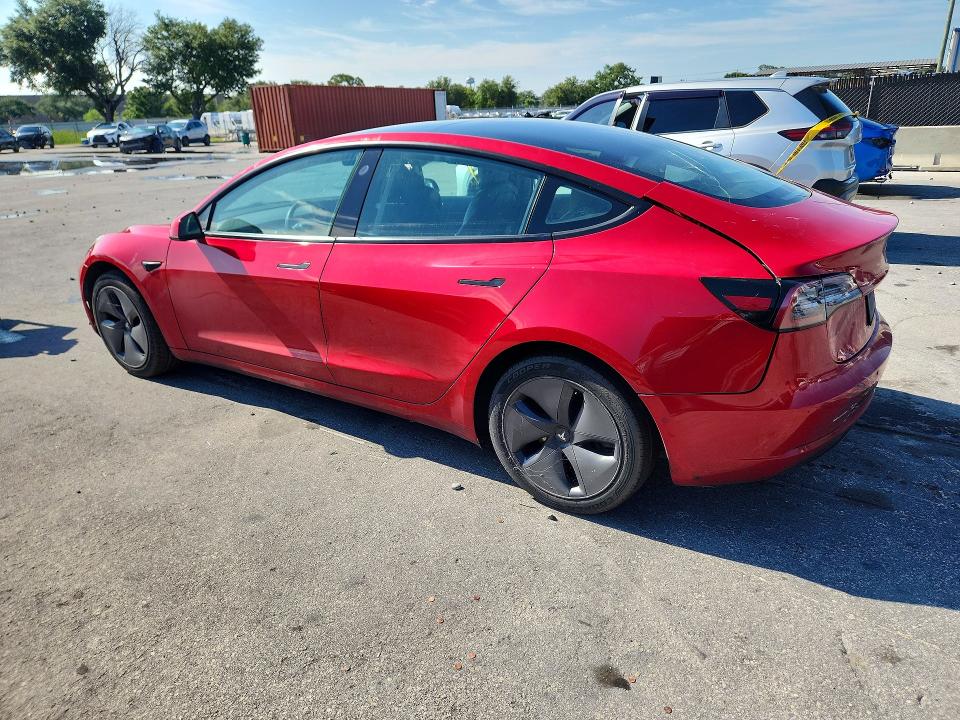 2021 Tesla Model 3 VIN 5YJ3E1EBXMF902886 COPART salvage auction — MINOR DENT/SCRATCHES, Fl - Certificate Of Title, sold $11,100 on 2026-07-27 (photo 2)