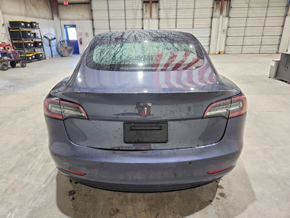 2022 Tesla Model 3 VIN 5YJ3E1EA9NF368563 COPART salvage auction — ALL OVER, Fl - Certificate Of Title, sold $8,600 on 2026-07-06 (photo 6)