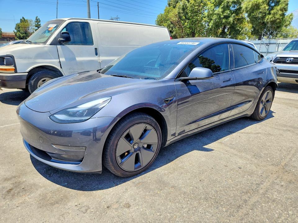 2023 Tesla Model 3 VIN 5YJ3E1EA8PF692056 COPART salvage auction — REAR END, Ca - Salvage Certificate, sold $7,700 on 2026-07-16 (photo 1)