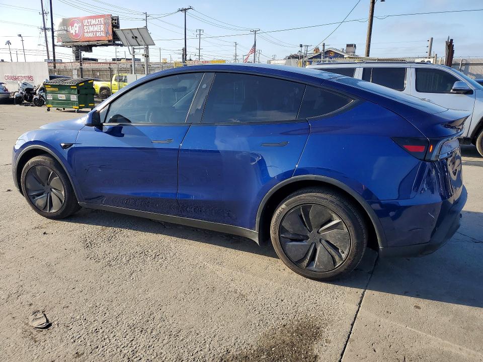 2026 Tesla Model y VIN 7SAYGDEDXTF407480 COPART salvage auction — SIDE, Ca - Salvage Certificate, sold $22,500 on 2026-07-09 (photo 2)