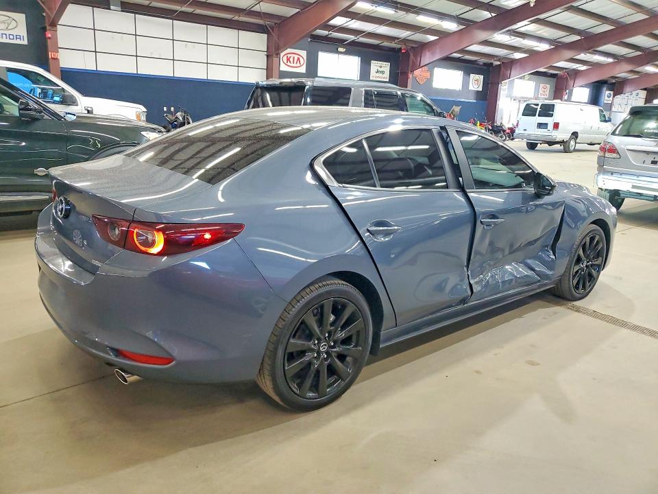 2025 Mazda VIN JM1BPBCM8S1775206 COPART salvage auction — SIDE, Tx - Certificate Of Title (P), sold $12,700 on 2026-07-23 (photo 3)