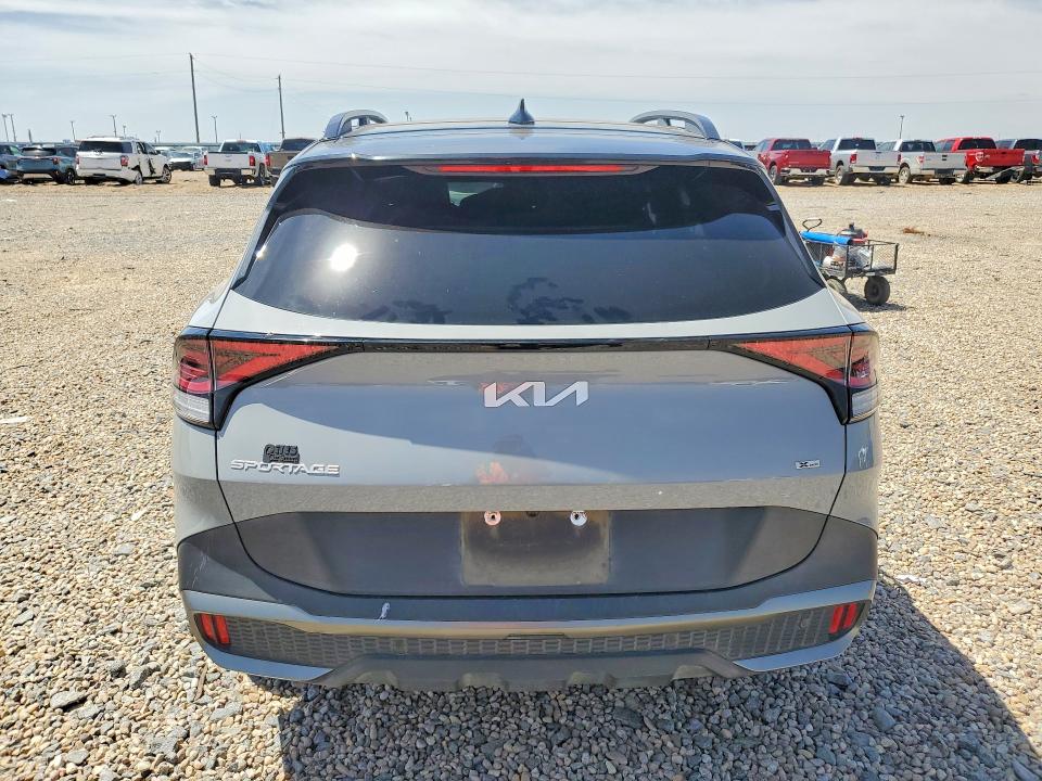 2023 Kia Sportage VIN 5XYK7CAF7PG007928 COPART salvage auction — FRONT END, TX - SALVAGE VEHICLE TITLE, sold $5,600 on 2026-08-20 (photo 6)