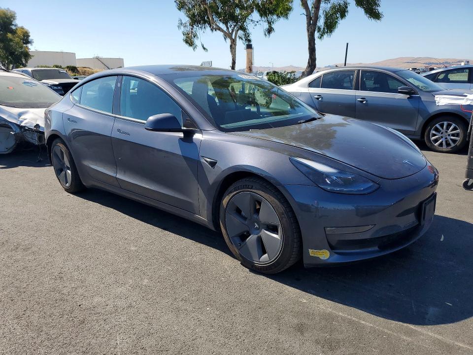 2022 Tesla Model 3 VIN 5YJ3E1EB9NF208109 COPART salvage auction — REAR END, Ca - Salvage Certificate, sold $10,100 on 2026-07-27 (photo 4)
