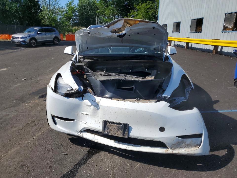 2023 Tesla Model y VIN 7SAYGDEEXPF637972 COPART salvage auction — FRONT END, Or - Wrecker's Notice (Parts Only), sold $6,100 on 2026-07-27 (photo 5)