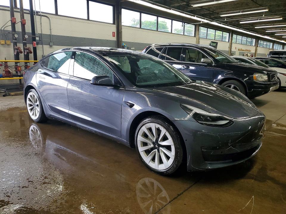 2023 Tesla Model 3 VIN 5YJ3E1EA7PF430156 COPART salvage auction — UNDERCARRIAGE, Il - Salvage Certificate, sold $5,200 on 2026-07-13 (photo 4)