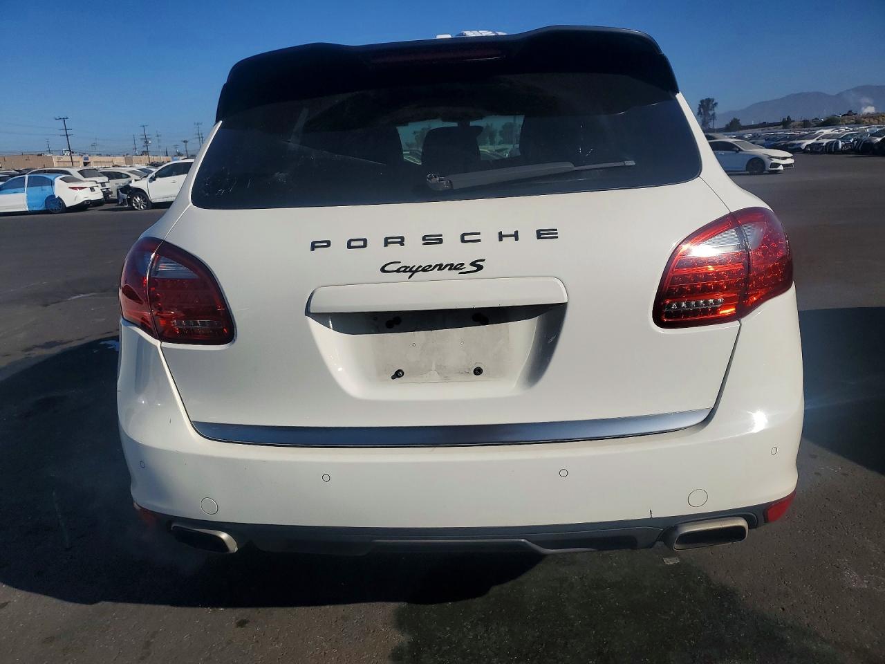 2011 Porsche Cayenne VIN WP1AB2A25BLA42058 COPART salvage auction — Side, FL - DIS/DLR/EXP ONLY CLEAN TITLE, sold $1,150 on 2026-07-08 (photo 6)
