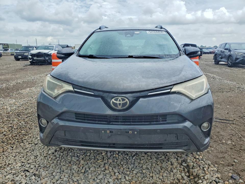 2017 Toyota Rav 4 VIN JTMWFREV5HJ712690 COPART salvage auction — SIDE, Tx - Salvage Vehicle Title, sold $5,700 on 2026-07-06 (photo 5)