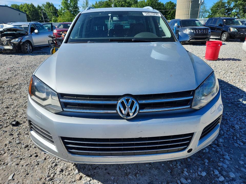 2014 Volkswagen VIN WVGEF9BP9ED004823 COPART salvage auction — MECHANICAL, MI - CERTIFICATE OF TITLE, sold $750 on 2026-07-30 (photo 5)