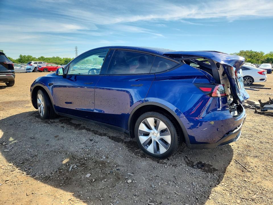 2023 Tesla Model y VIN 7SAYGDEE0PA205372 COPART salvage auction — REAR END, Il - Salvage Certificate, sold $9,900 on 2026-07-29 (photo 2)
