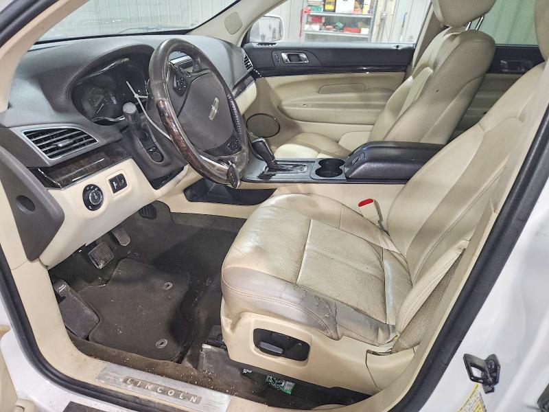 2013 Lincoln Mkt VIN 2LMHJ5AT2DBL57058 COPART salvage auction — MECHANICAL, Ak - Certificate Of Vehicle Title, sold $25 on 2026-07-21 (photo 7)