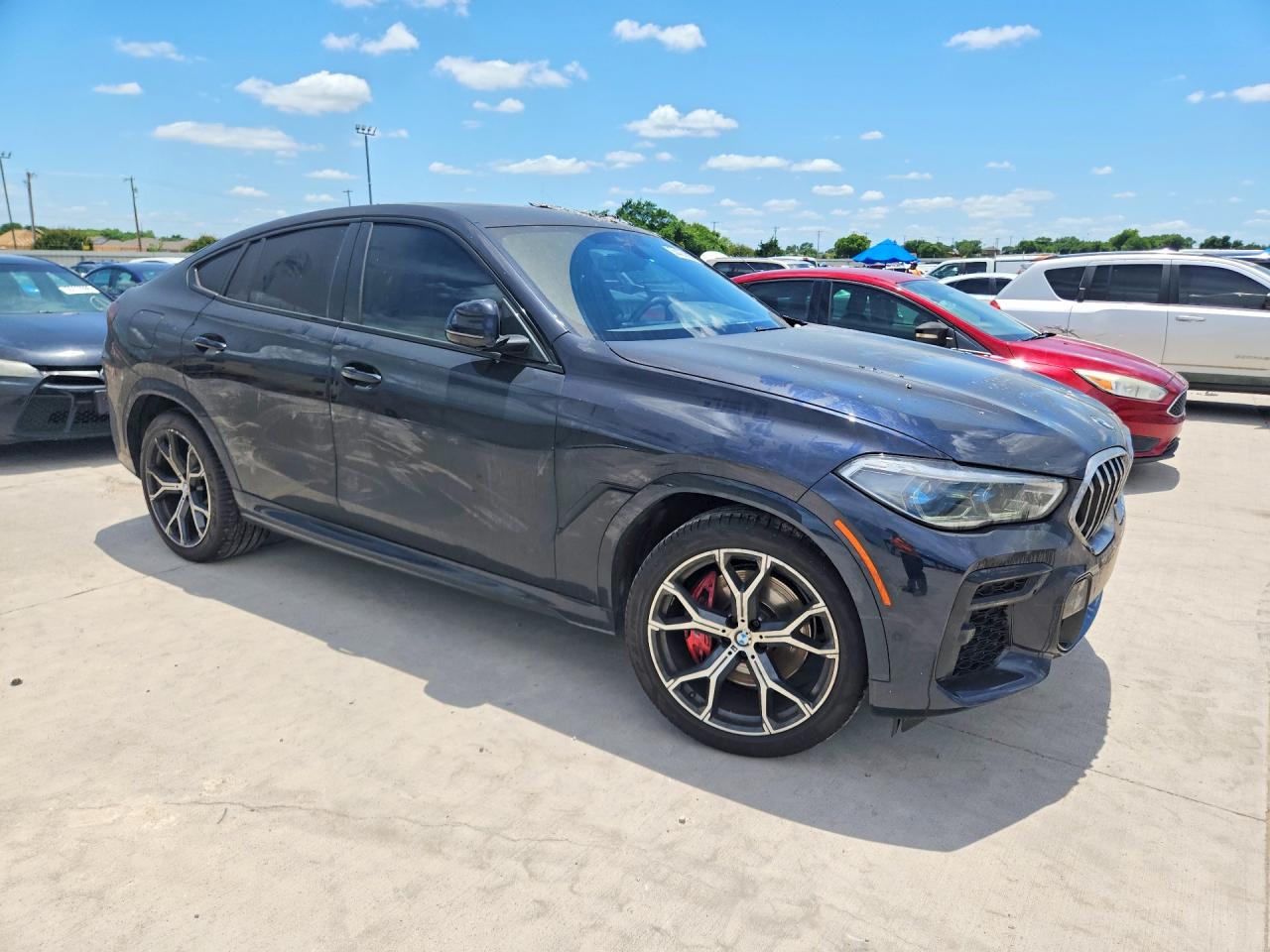 2023 BMW X6 VIN 5UXCY6C09P9P64972 COPART salvage auction — Burn, TX - SALVAGE VEHICLE TITLE, sold $28,750 on 2026-07-02 (photo 4)