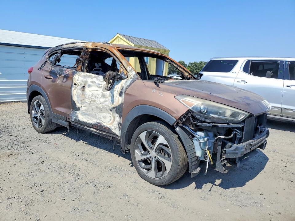 2016 Hyundai Tucson VIN KM8J3CA26GU241458 COPART salvage auction — VANDALISM, CA - NON-REPAIRABLE VEHICLE CERT, sold $200 on 2026-07-28 (photo 4)
