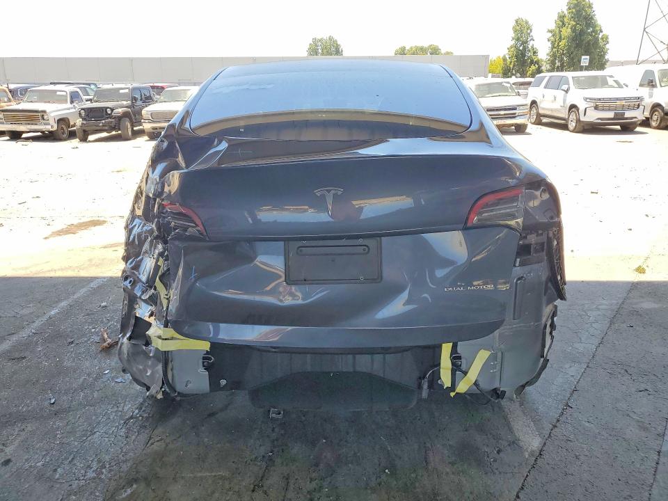 2023 Tesla Model y VIN 7SAYGDEE2PF625377 COPART salvage auction — REAR END, Ca - Salvage Certificate, sold $7,700 on 2026-07-07 (photo 6)