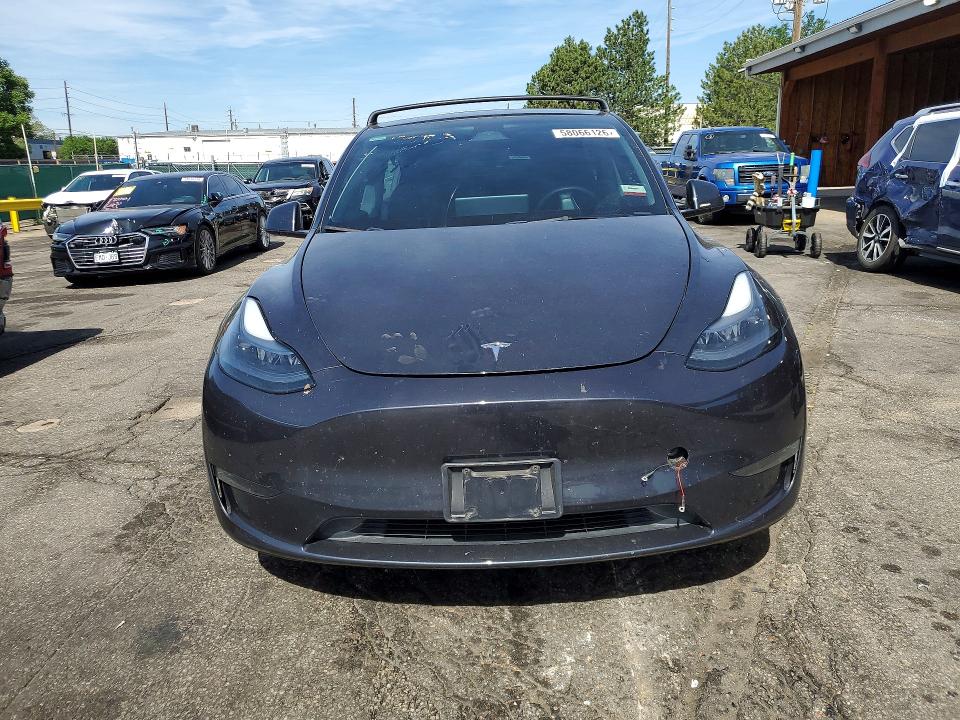 2024 Tesla VIN 7SAYGAEE8RF035542 COPART salvage auction — SIDE, Co - Public - Salvage Title, sold $11,000 on 2026-07-07 (photo 5)