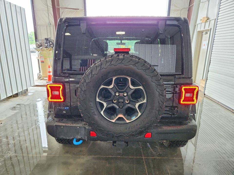 2022 Jeep Wrangler unlimited VIN 1C4JJXR65NW178654 COPART salvage auction — NORMAL WEAR, IL - CERTIFICATE OF TITLE, sold $19,900 on 2026-07-16 (photo 6)