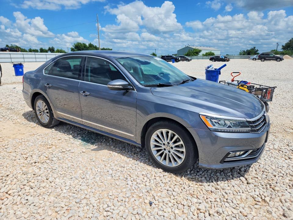 2016 Volkswagen Passat VIN 1VWBS7A32GC059822 COPART salvage auction — SIDE, Tx - Salvage Vehicle Title, sold $3,000 on 2026-07-09 (photo 4)