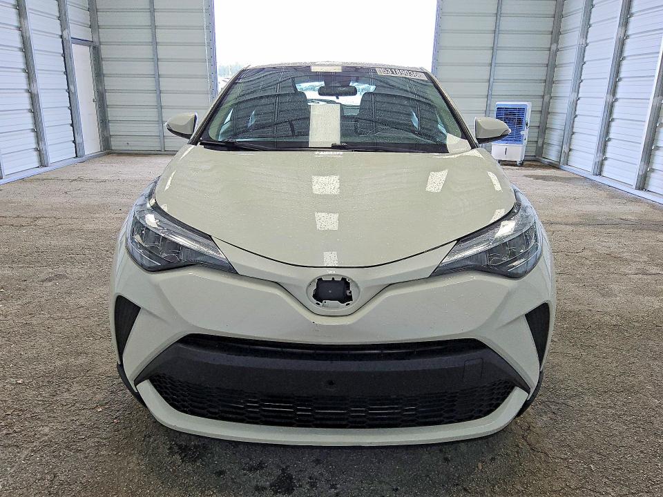 2021 Toyota C-hr VIN NMTKHMBX1MR129708 COPART salvage auction — MINOR DENT/SCRATCHES, Fl - Certificate Of Title, sold $8,500 on 2026-07-07 (photo 5)