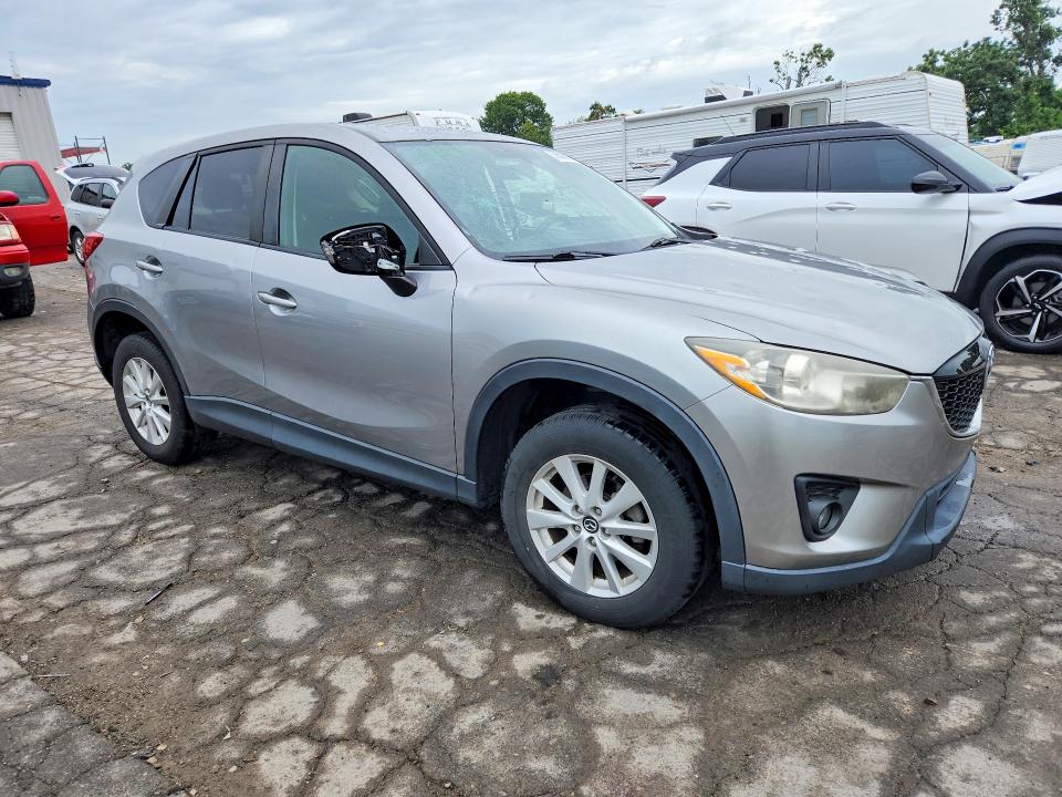 2014 Mazda VIN JM3KE4CY5E0329973 COPART salvage auction — HAIL, Mo - Salvage Certificate Of Title, sold $2,650 on 2026-07-20 (photo 4)