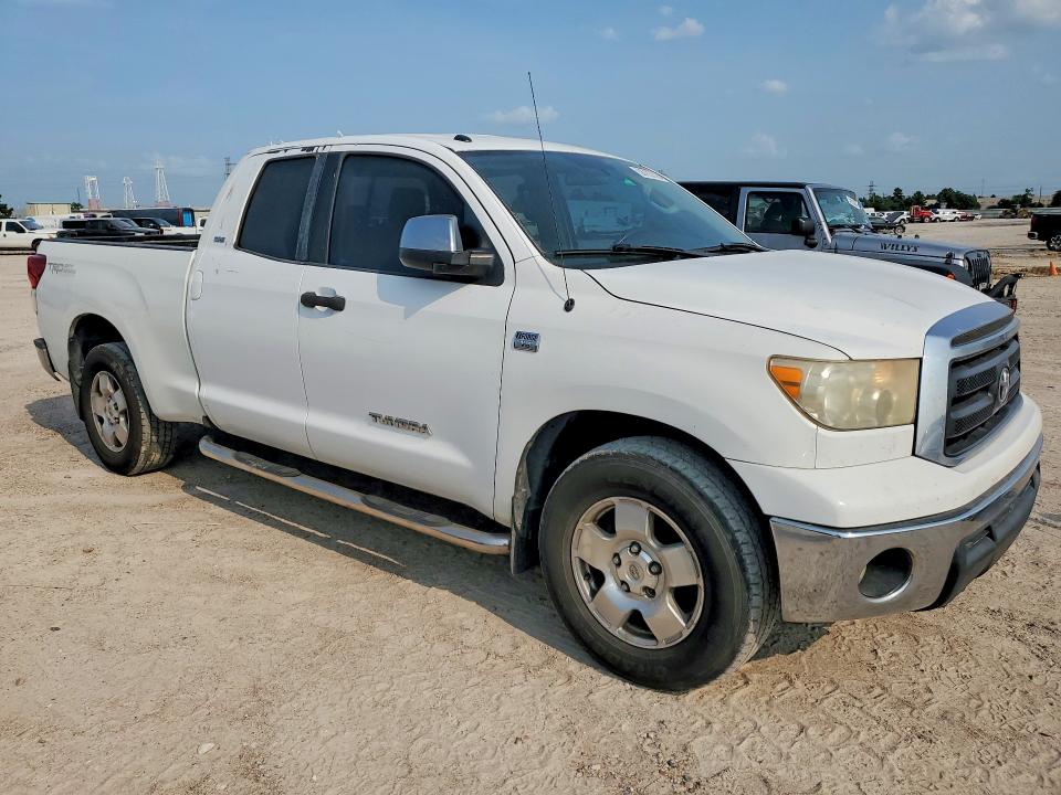 2011 Toyota Tundra VIN 5TFRM5F11BX028411 COPART salvage auction — NORMAL WEAR, Fl - Cert Of Title Slvg Rebuildable, sold $3,200 on 2026-07-24 (photo 4)