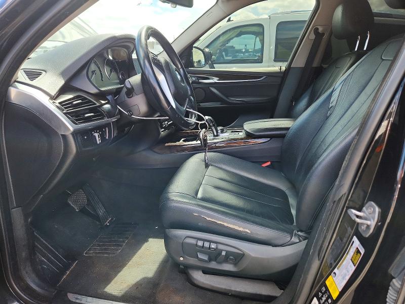 2015 BMW VIN 5UXKR0C58F0P11460 COPART salvage auction — NORMAL WEAR, Tx - Certificate Of Title, sold $4,250 on 2026-07-09 (photo 7)