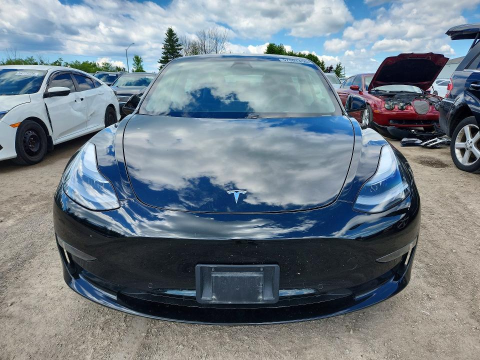 2021 Tesla Model 3 VIN 5YJ3E1EA2MF962443 COPART salvage auction — SIDE, On - Permit No Brand - Unfit, sold $9,400 on 2026-07-07 (photo 5)