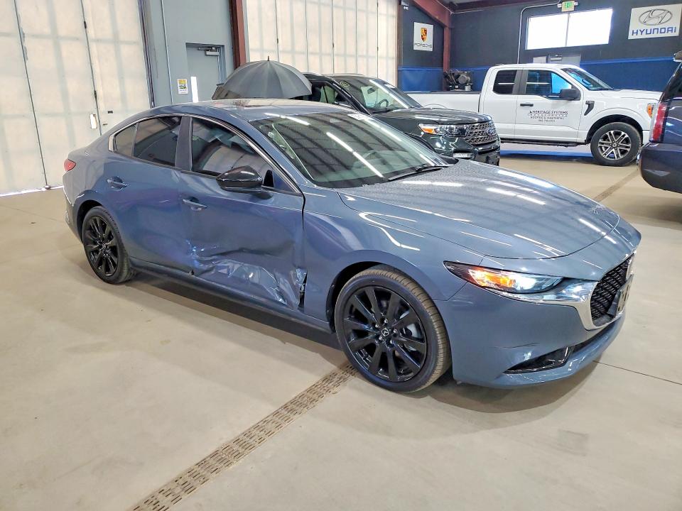 2025 Mazda VIN JM1BPBCM8S1775206 COPART salvage auction — SIDE, Tx - Certificate Of Title (P), sold $12,700 on 2026-07-23 (photo 4)