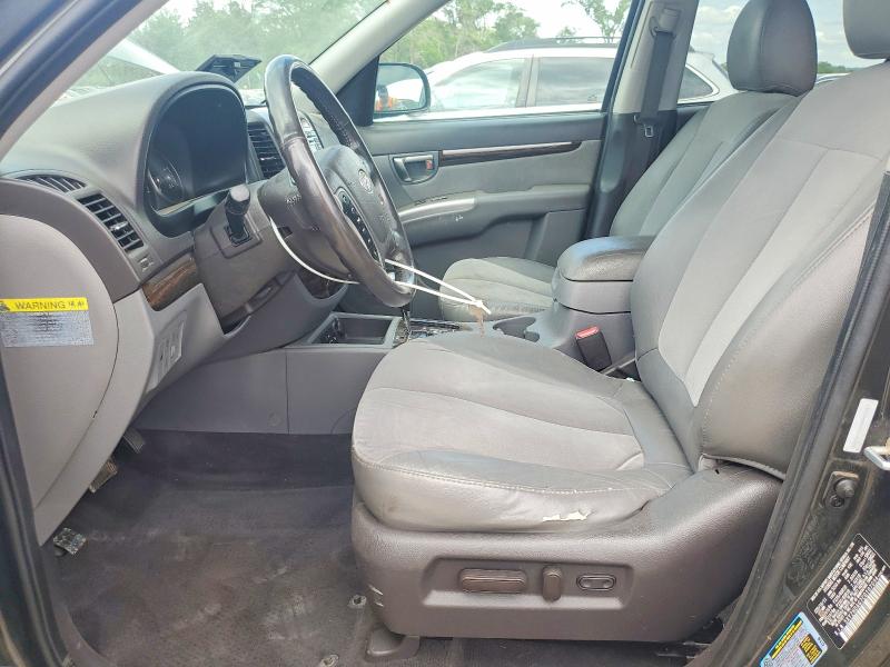 2012 Hyundai Santa fe VIN 5XYZHDAG7CG107094 COPART salvage auction — MECHANICAL, Ia - Certificate Of Title, sold $650 on 2026-07-06 (photo 7)