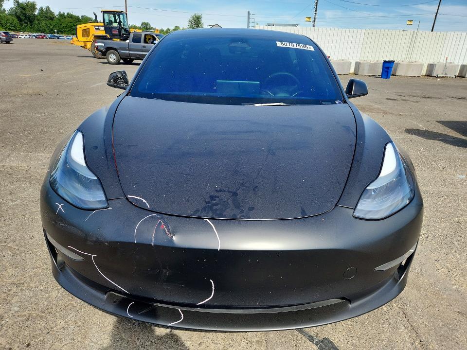 2022 Tesla Model 3 VIN 5YJ3E1EC7NF129773 COPART salvage auction — SIDE, Or - Salvage Title Certificate, sold $1,050 on 2026-07-29 (photo 5)