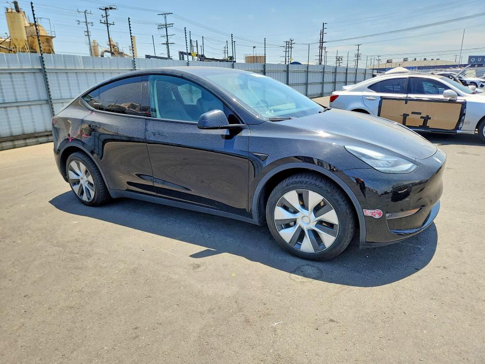 2022 Tesla Model y VIN 7SAYGDEE8NF511378 COPART salvage auction — REAR END, Ca - Salvage Certificate, sold $11,100 on 2026-07-27 (photo 4)