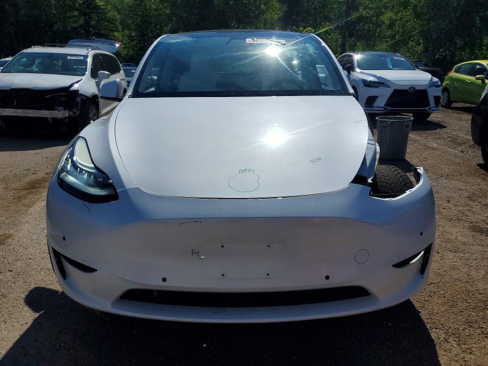 2021 Tesla Model y VIN 5YJYGAEE4MF189669 COPART salvage auction — SIDE, On - Permit No Brand - Unfit, sold $11,500 on 2026-07-09 (photo 5)