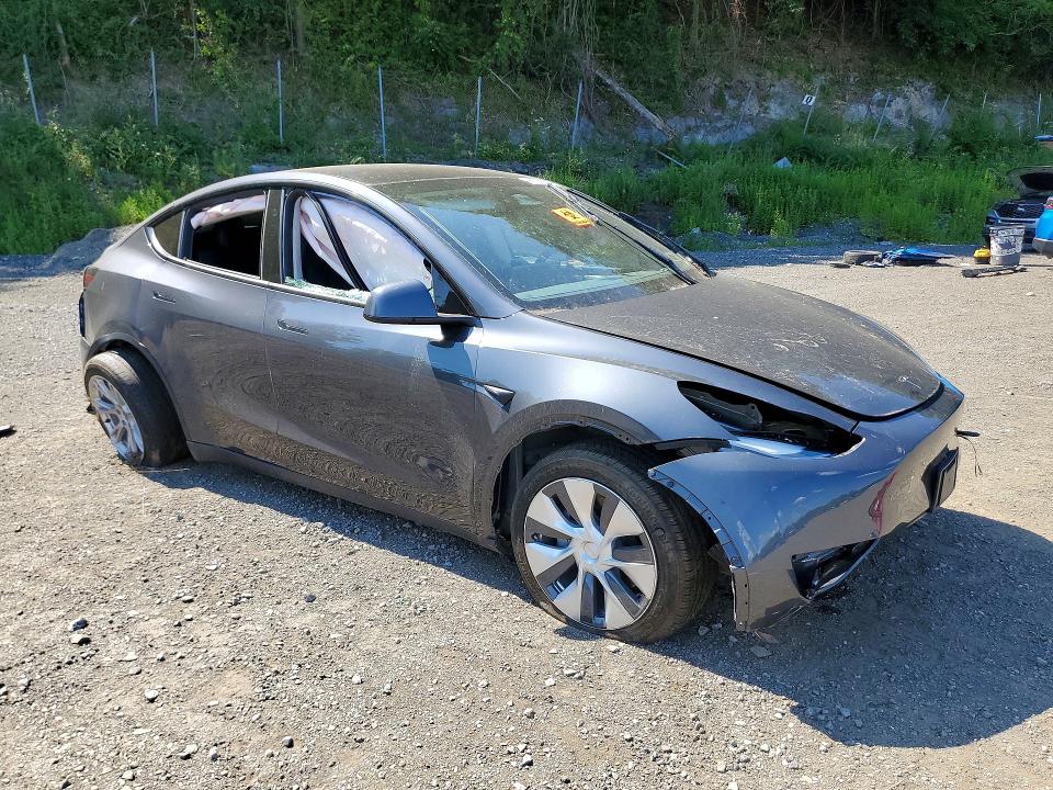 2023 Tesla Model y VIN 7SAYGAEE5PF932668 COPART salvage auction — FRONT END, NY - MV-907A SALVAGE CERTIFICATE, sold $9,300 on 2026-07-28 (photo 4)
