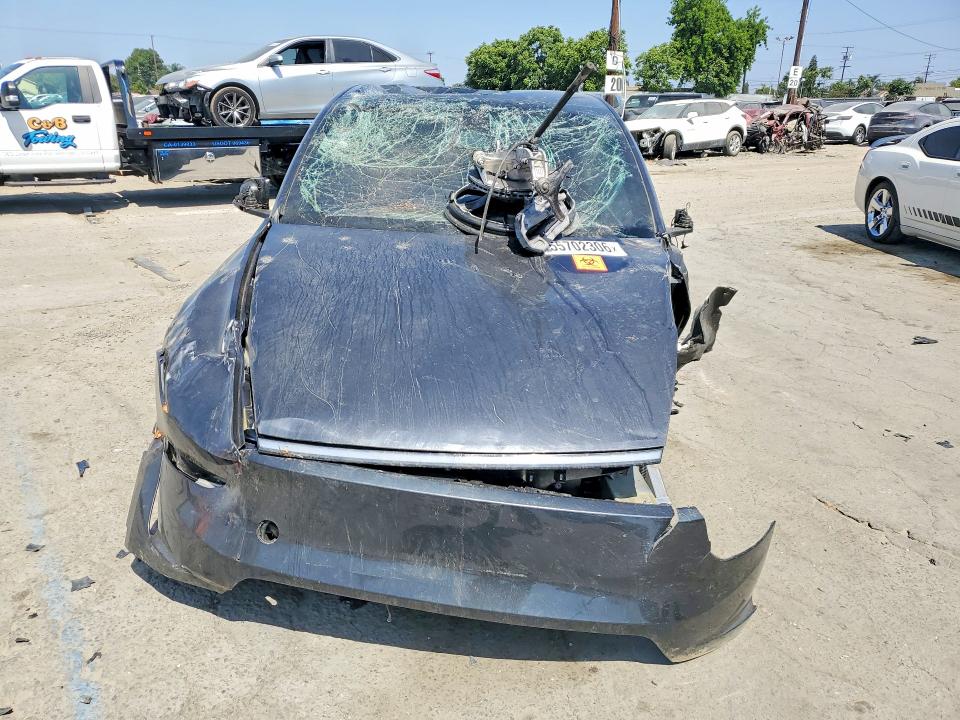 2026 Tesla Model y VIN 7SAYGDEE2TF574957 COPART salvage auction — ALL OVER, CA - SALVAGE CERTIFICATE, sold $12,200 on 2026-07-16 (photo 5)