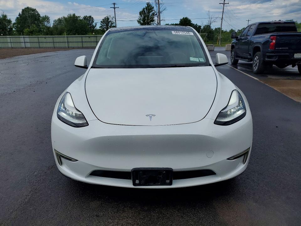 2023 Tesla Model y VIN 7SAYGDEE1PF611177 COPART salvage auction — REAR END, Ny - Cert Of Title-Rebuilt Salvage, sold $14,300 on 2026-07-06 (photo 5)