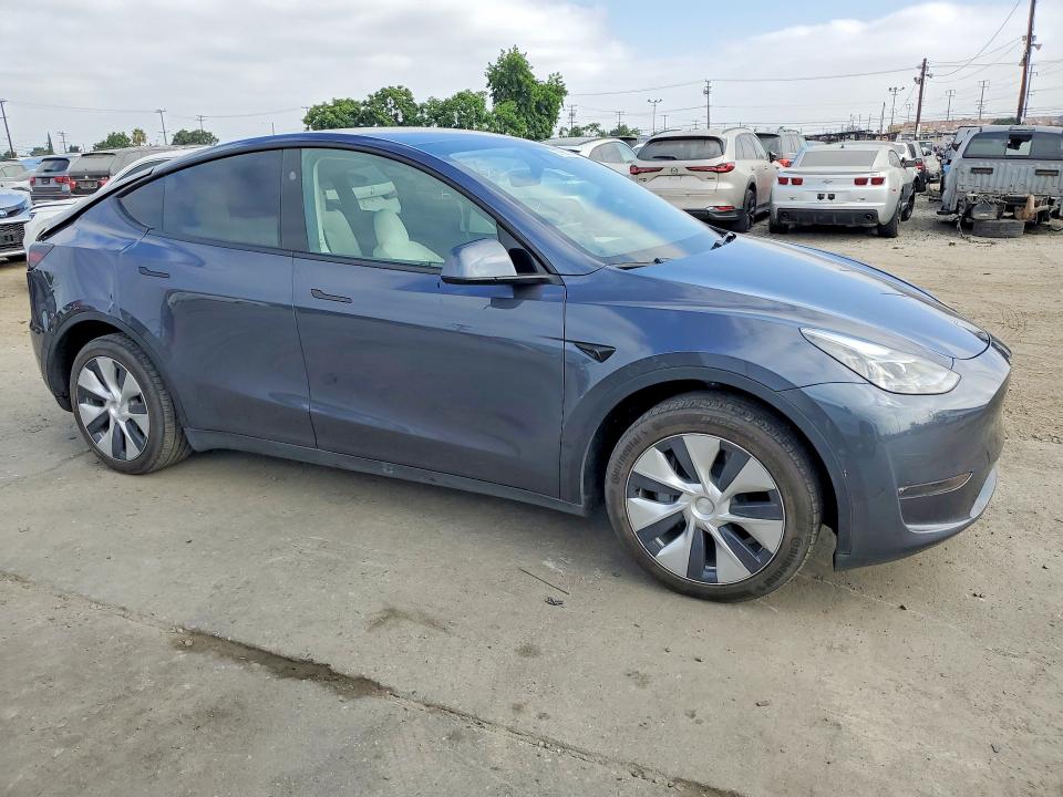 2023 Tesla Model y VIN 7SAYGDEE0PF840045 COPART salvage auction — REAR END, Az - Dis/Dlr/Exp Only Salvage Title, sold $15,200 on 2026-07-29 (photo 4)