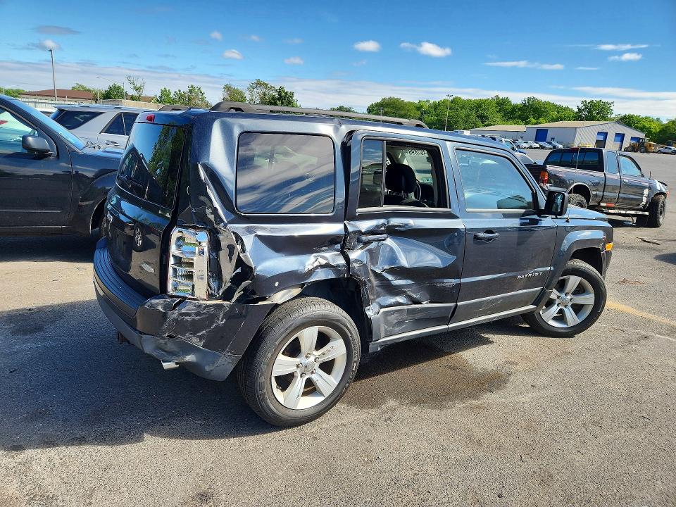 2014 Jeep VIN 1C4NJRFB8ED687647 COPART salvage auction — SIDE, NJ - CERT OF TITLE-SALVAGE (P), sold $900 on 2026-07-02 (photo 3)
