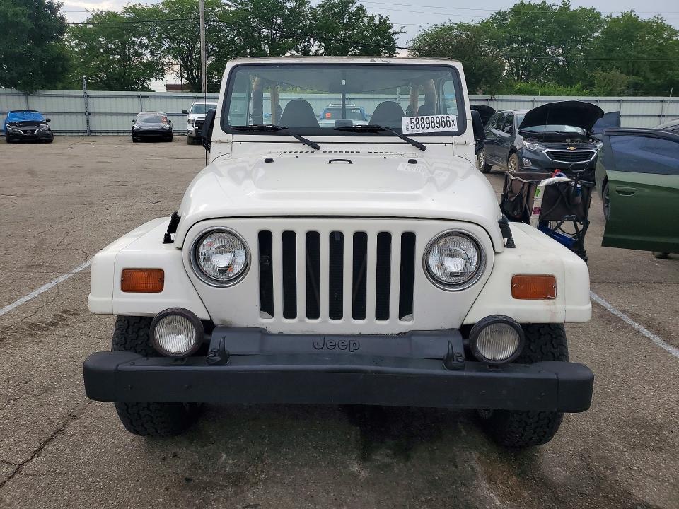 1997 Jeep Wrangler / VIN 1J4FY49S7VP520381 COPART salvage auction — MINOR DENT/SCRATCHES, Oh - Certificate Of Title, sold $2,400 on 2026-07-08 (photo 5)